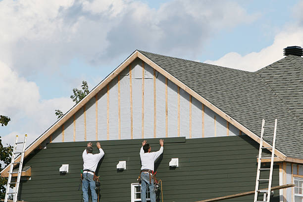Professional Siding Contractor technician working in Shawboro, NC